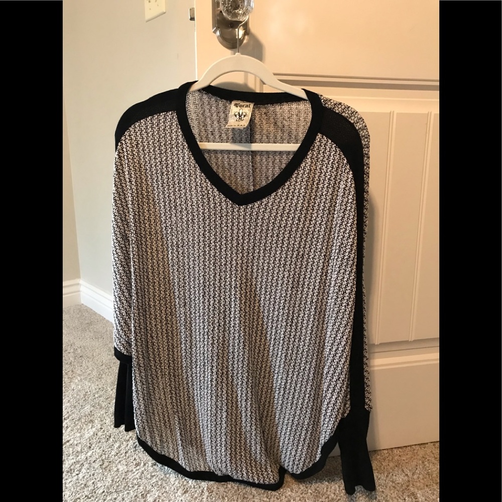 Vocal pullover shrug top.